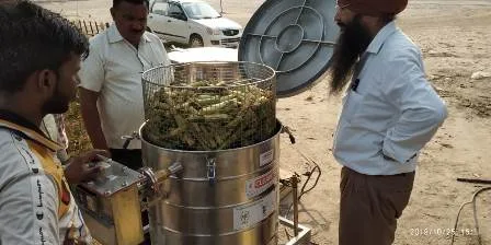 Sugarcane seed treatment device