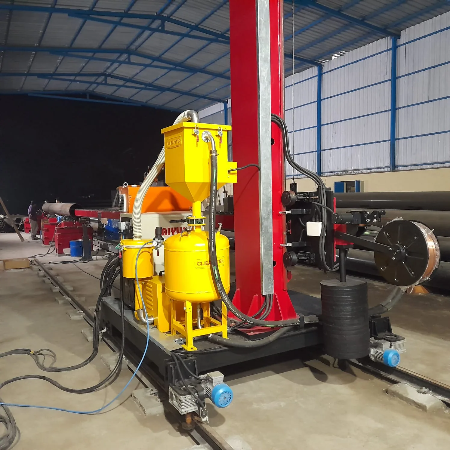 Submerged arc welding flux feeding system